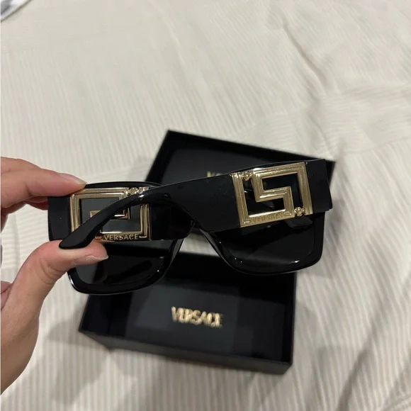 Versace Elegant Black Sunglasses with Gold Accent display picture 1
